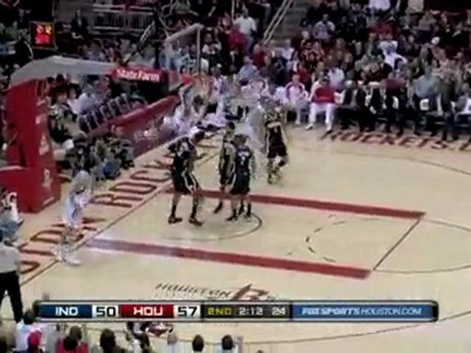 Luis Scola throws the rock off the glass and Trevor Ariza sl