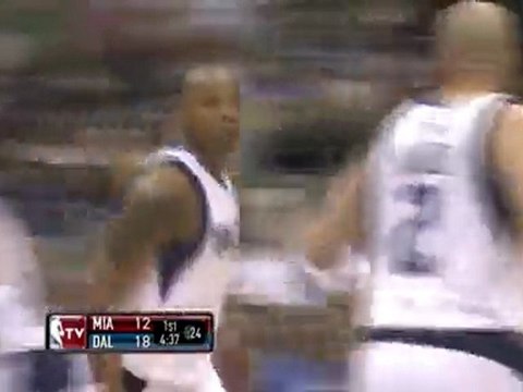 Caron Butler weaves his way through the defense and gets the