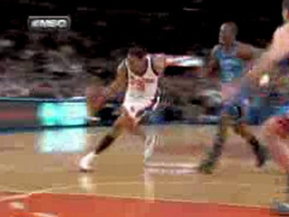 Tracy McGrady scores his first basket as a New York Knick.