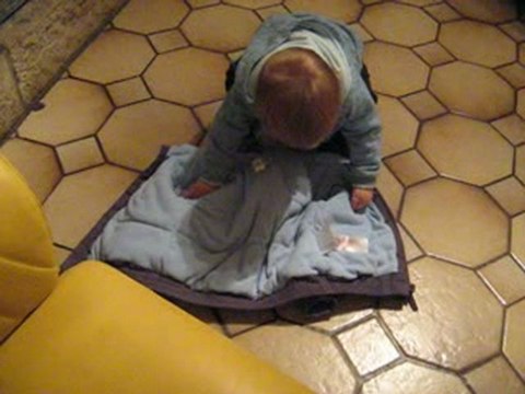 Je mets mon manteau tout seul