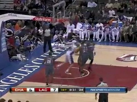 Chris Kaman grabs the offensive board and throws down the fo