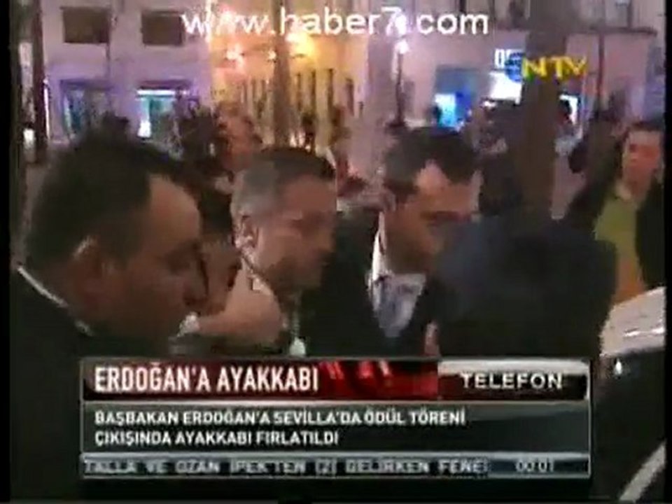 سكران يقذف أردوغان بالحذاء في إسبانيا