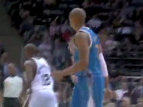 Andrew Bogut rises up and swats Marcus Thorton's shot away f