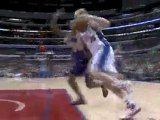 Chris Kaman drives the baseline, stops, spins and gets the h