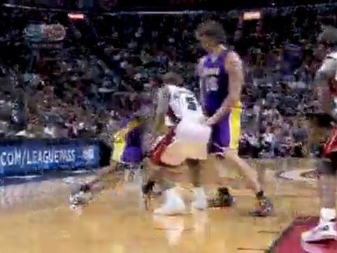 Michael Beasley blocks Pau Gasol but Andrew Bynum picks up t