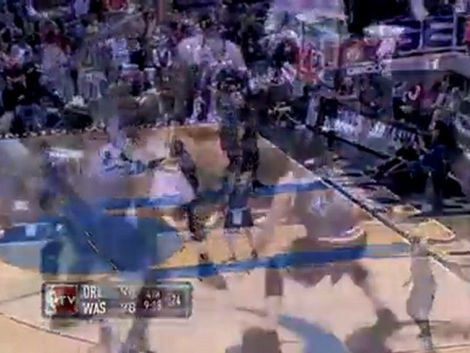 Alonzo Gee rocks the rim with this big two-handed slam.