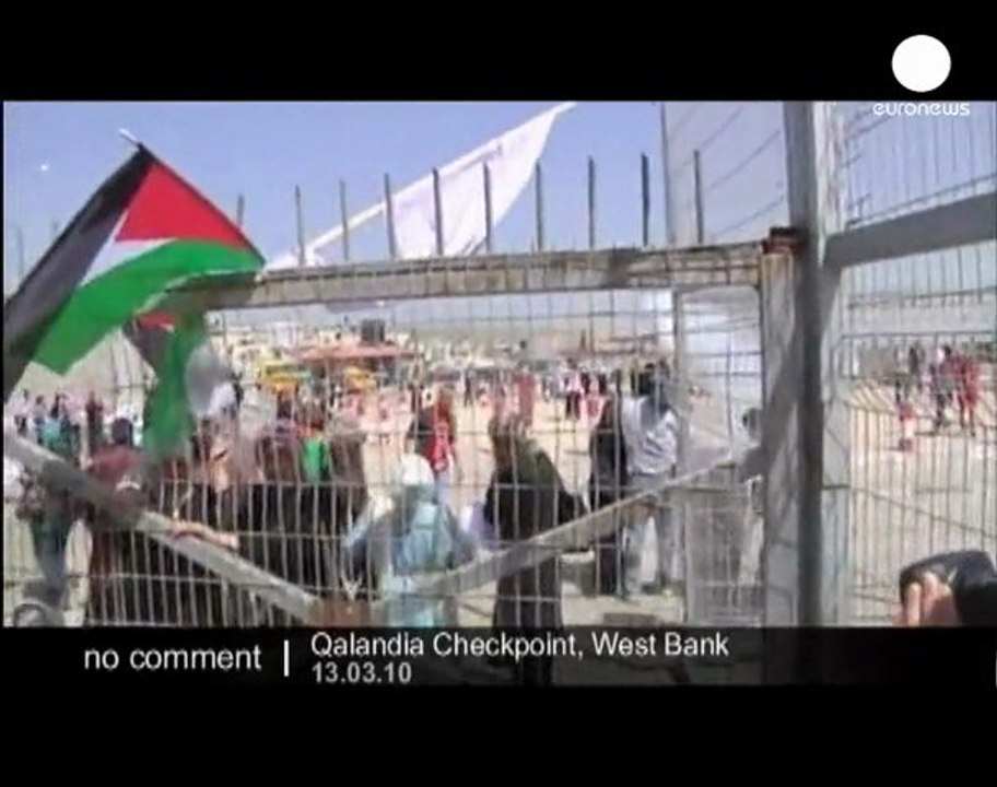 Palestinians protesting against the on-going...