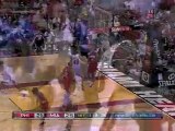 Dwyane Wade throws a behind-the-back pass to Udonis Haslem,