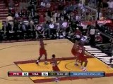 Dwyane Wade takes the pass and finishes with a nice layup.