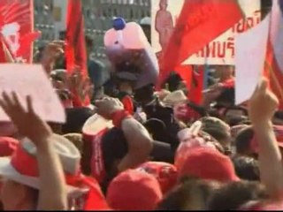 Protesters pour blood outside Thai PM office