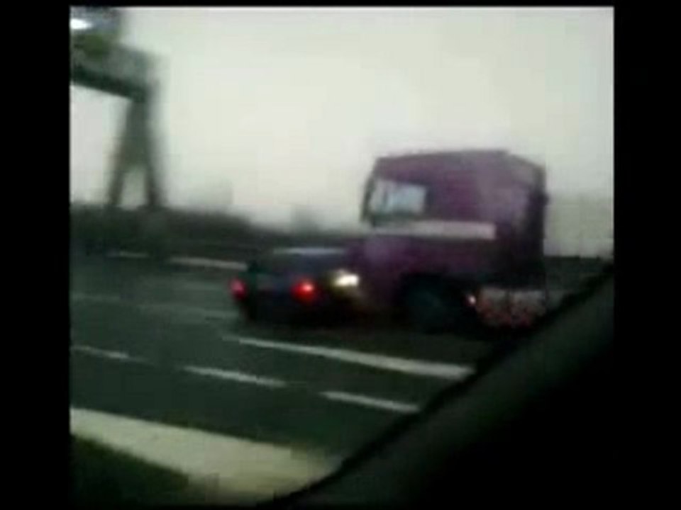 Unbelievable pictures of car trapped on bumper of tanker