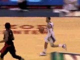 Devin Harris spins past a defender and sinks an amazing layu