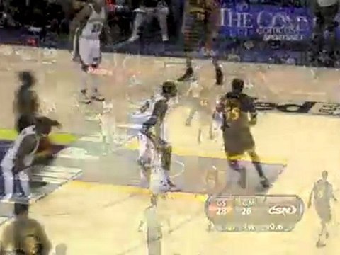 Reggie Williams somehow gets this shot to fall and the foul.