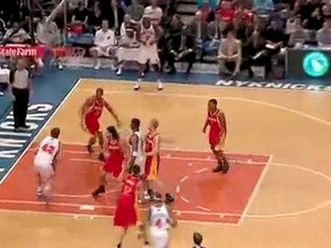 Tracy McGrady drives past Chase Budinger and finds David Lee