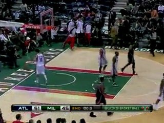 Mike Bibby finishes out the half by making a three-point sho