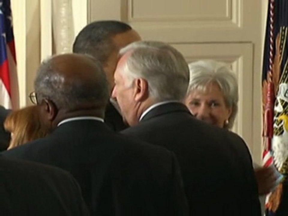 Obama signs historic healthcare bill