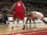 Derrick Rose passes between Javis Hayes' legs for the give a