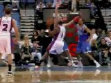 Dwyane Wade throws a nice pass to Joel Anthony, who finishes