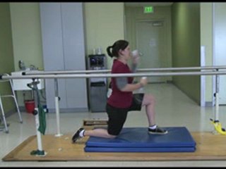 Wii the parallel bars and half kneeling
