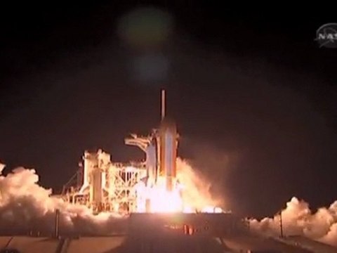 Space shuttle Discovery launches
