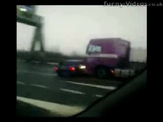 Lorry Driver Pushes A Car
