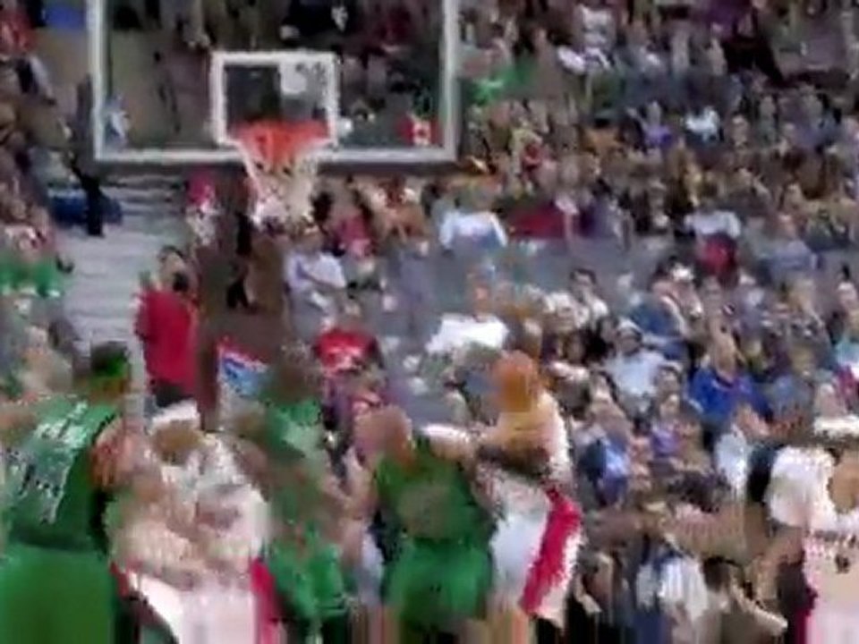 Andrea Bargnani gets the big block in the lane and Antoine W