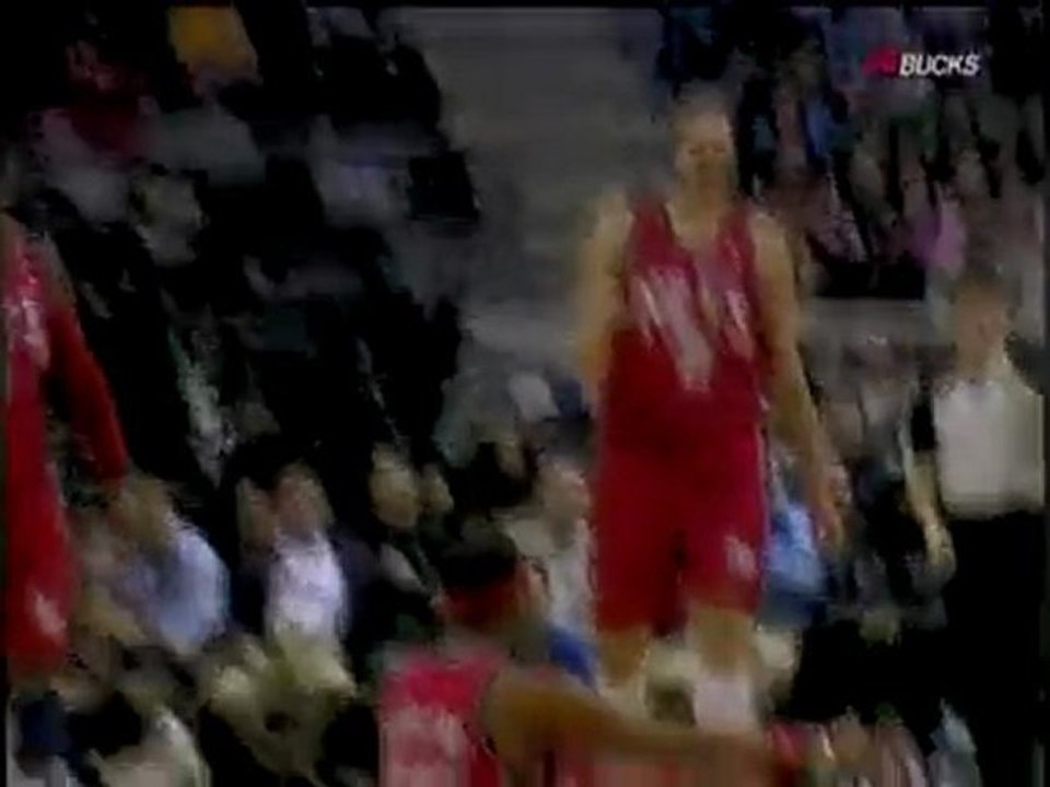 Keyon Dooling gets fouled as he hits the long 3-pointer.