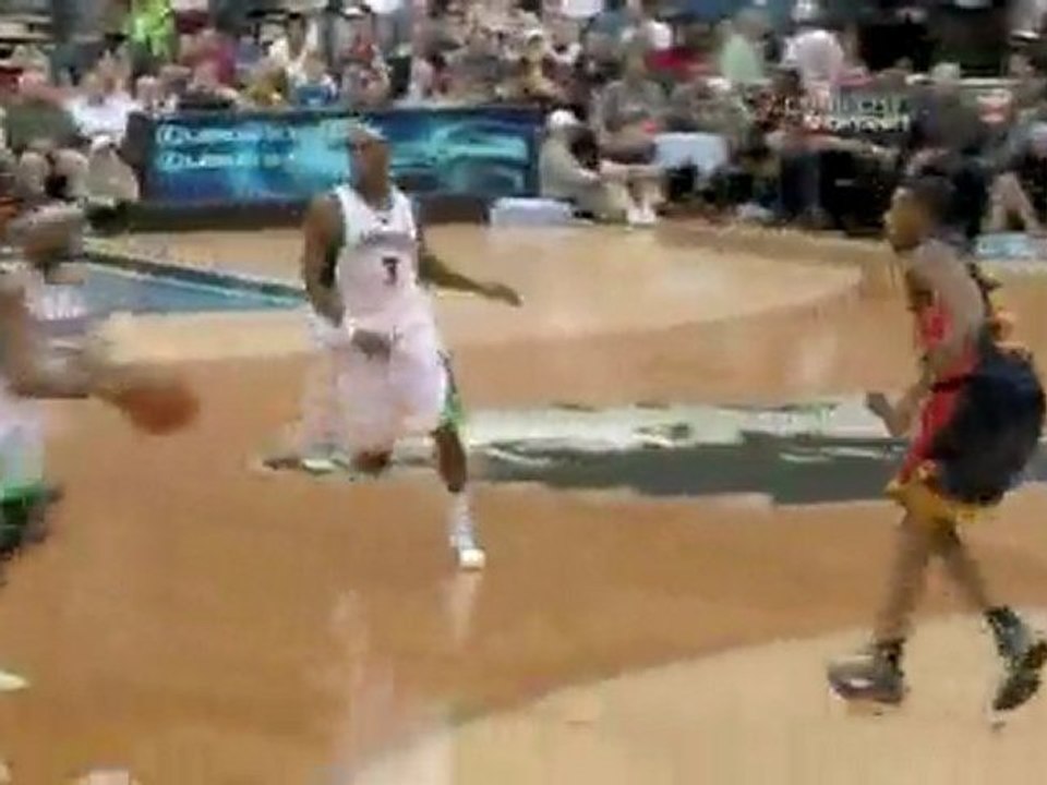 Corey Brewer drives the lane and gets position to get the la