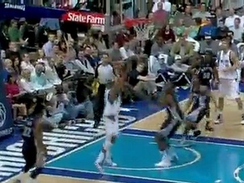 Caron Butler drives to the hole and flies over the defense f