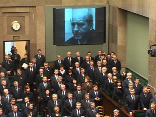 First lady's body returns to grief-stricken Poland