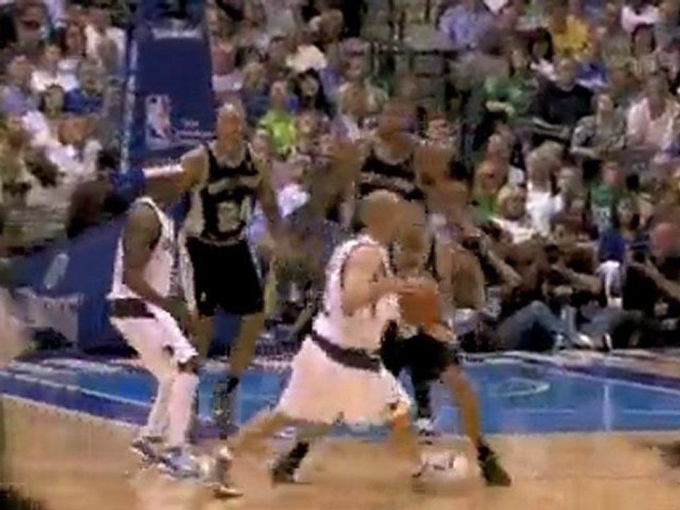 Dirk Nowitzki spins through the defense and hits the layup.