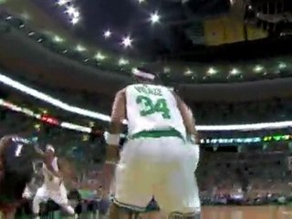 Paul Pierce comes across the baseline to meet Dorrell Wright