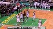 Dwyane Wade puts back the miss with a two-handed dunk.