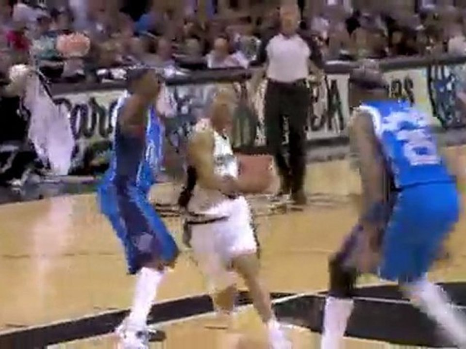 Tony Parker drives to the hole on Jason Terry and gets the t