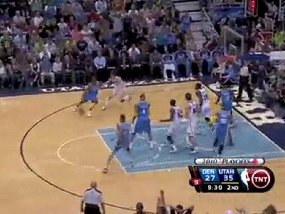 Ronnie Price swats away the shot by a driving Ty Lawson.