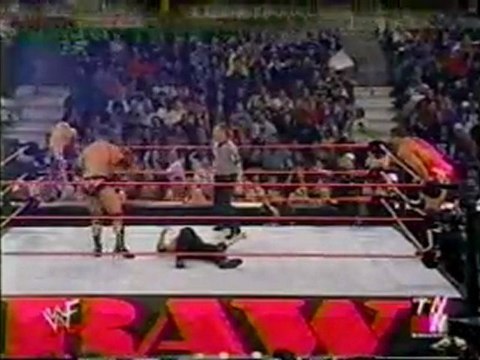 The Rock & Trish Stratus vs Mr. McMahon & Kurt Angle