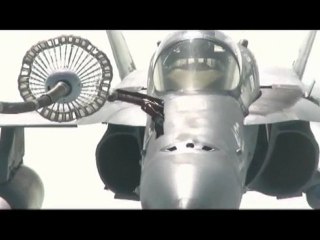 U.S. Navy F/A-18C Hornet receives fuel from U.S. Air Force K