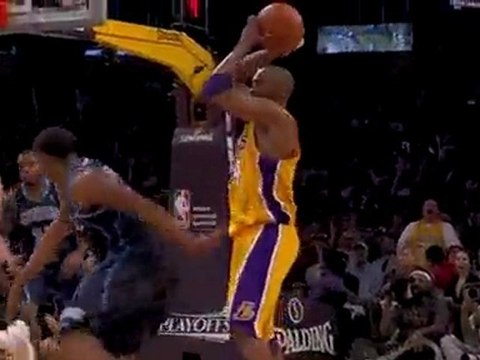 Kobe Bryant blocks the shot and gets the ball ahead to Shann
