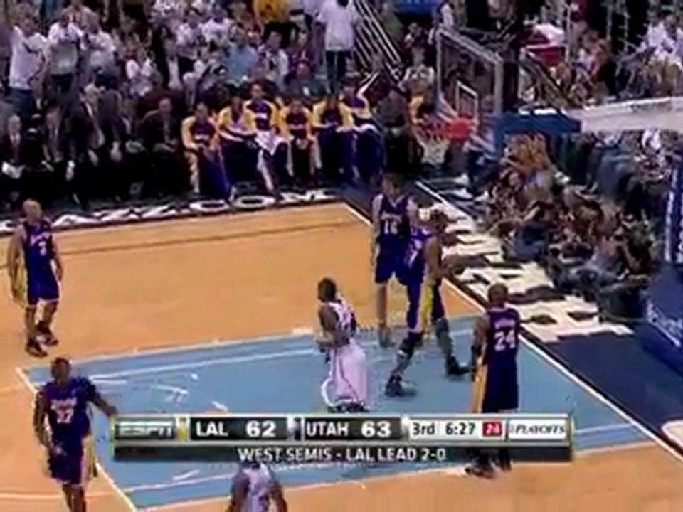 Paul Millsap drives around Pau Gasol and gets the layup to f