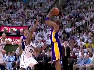 Kobe Bryant steps behind the 3-point line and knocks down th