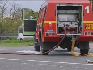 Pilot rescued after crashing into car