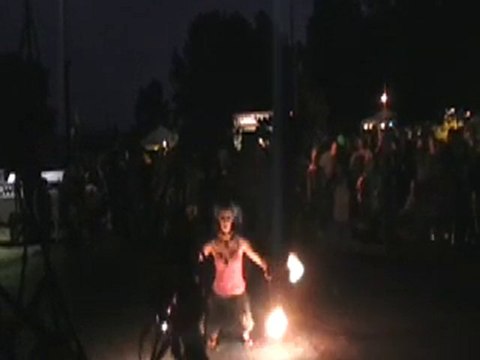 April RED DeBord performing with Fire Poi to Pump it