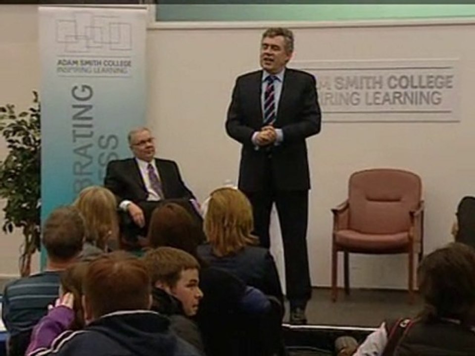 Brown jokes with college students