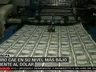 Euro cae en su nivel más bajo frente al dólar