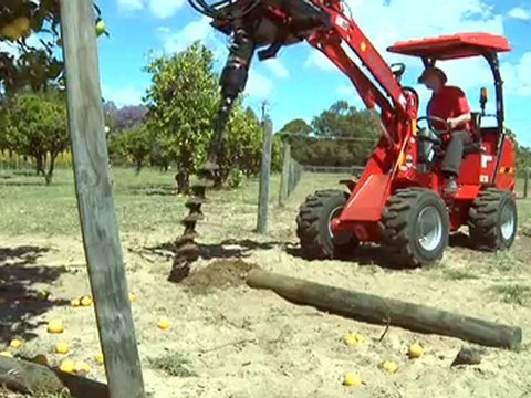 Mini wheel loader -Schaffer Wheel Loader demonstrating tools