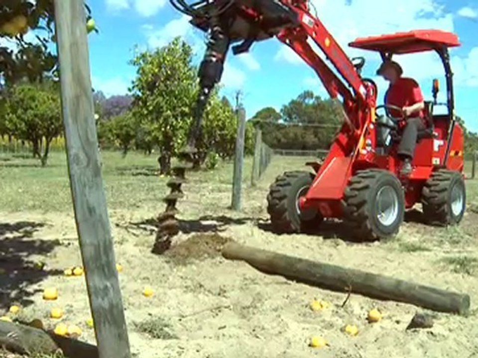 Mini wheel loader -Schaffer Wheel Loader demonstrating tools
