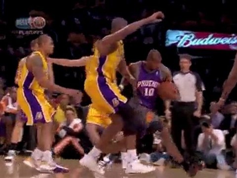 The Suns' Leandro Barbosa blows by the defense and gets to t