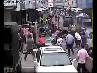 Purse Snatchers on a Motorcycle Beaten by Angr