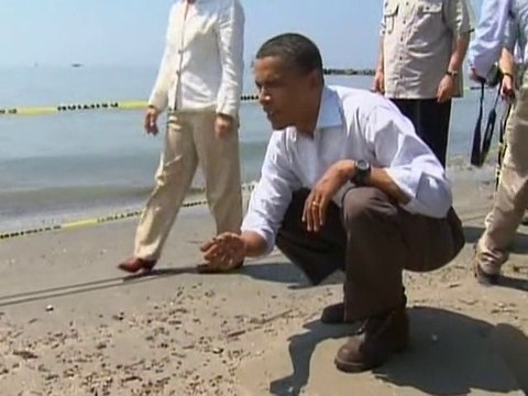 Obama visits oil-slicked Louisiana coast
