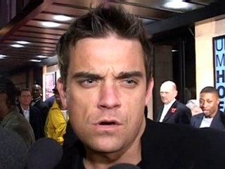 Olly Murs says he is not Robbie Williams' dummy